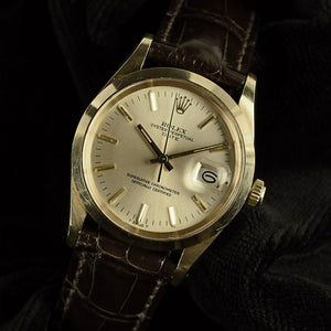 Rolex Oyster Perpetual Date - A 14k Gold Reference 15007 - Silver Sunburst Dial - c.1983