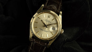 Rolex Oyster Perpetual Date - A 14k Gold Reference 15007 - Silver Sunburst Dial - c.1983
