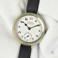 Ladysmith Swiss MadeScrew Case Trench Watch With Red 12(Needs Research) - Vintage Watch Specialist