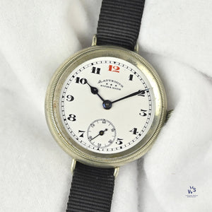 Ladysmith Swiss MadeScrew Case Trench Watch With Red 12(Needs Research) - Vintage Watch Specialist