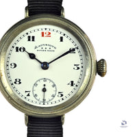 Ladysmith Swiss MadeScrew Case Trench Watch With Red 12(Needs Research) - Vintage Watch Specialist