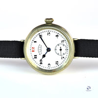 Ladysmith Swiss MadeScrew Case Trench Watch With Red 12(Needs Research) - Vintage Watch Specialist