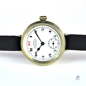Ladysmith Swiss MadeScrew Case Trench Watch With Red 12(Needs Research) - Vintage Watch Specialist