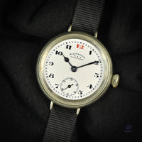 Ladysmith Swiss MadeScrew Case Trench Watch With Red 12(Needs Research) - Vintage Watch Specialist