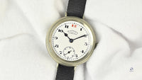 Ladysmith Swiss MadeScrew Case Trench Watch With Red 12(Needs Research) - Vintage Watch Specialist
