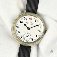 Ladysmith Swiss MadeScrew Case Trench Watch With Red 12(Needs Research) - Vintage Watch Specialist