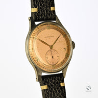 Longines Vintage Blush Pink Jumbo Roman Dial - c.1945 - Vintage Watch Specialist