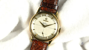 Omega 9k Gold Geneve Dress Watch Model ref: 13332 Cross Hair Dial c.1950s Vintage Watch Specialist