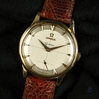 Omega 9k Gold Geneve Dress Watch Model ref: 13332 Cross Hair Dial c.1950s Vintage Watch Specialist