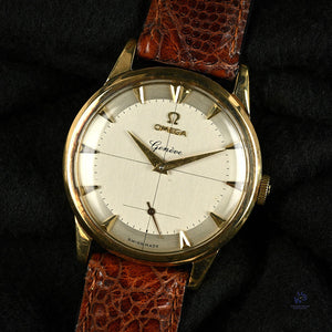 Omega 9k Gold Geneve Dress Watch Model ref: 13332 Cross Hair Dial c.1950s Vintage Watch Specialist