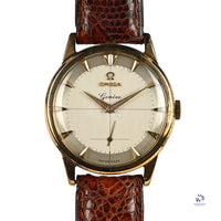 Omega 9k Gold Geneve Dress Watch Model ref: 13332 Cross Hair Dial c.1950s Vintage Watch Specialist