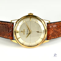 Omega 9k Gold Geneve Dress Watch Model ref: 13332 Cross Hair Dial c.1950s Vintage Watch Specialist