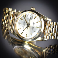 Rolex Oyster Perpetual Date - A 14k Gold Reference 15007 - Silver Sunburst Dial - c.1983 - Vintage Watch Specialist