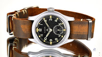 Timor - British Military Issued - ’Dirty Dozen’ - Wristwatch - Caseback K 13708 - c.1944 - Vintage Watch Specialist