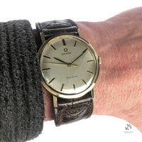 Omega Genève in 9k Gold - Silver Brushed Satin Dial - Shackman Case - c.1970 - Vintage Watch Specialist