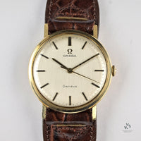 Omega Genève in 9k Gold - Silver Brushed Satin Dial - Shackman Case - c.1970 - Vintage Watch Specialist