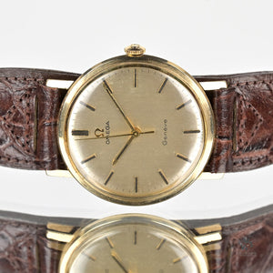 Omega Genève in 9k Gold - Silver Brushed Satin Dial - Shackman Case - c.1970 - Vintage Watch Specialist