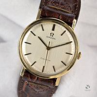 Omega Genève in 9k Gold - Silver Brushed Satin Dial - Shackman Case - c.1970 - Vintage Watch Specialist