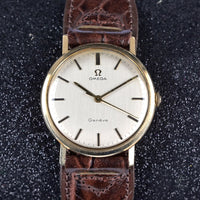 Omega Genève in 9k Gold - Silver Brushed Satin Dial - Shackman Case - c.1970 - Vintage Watch Specialist