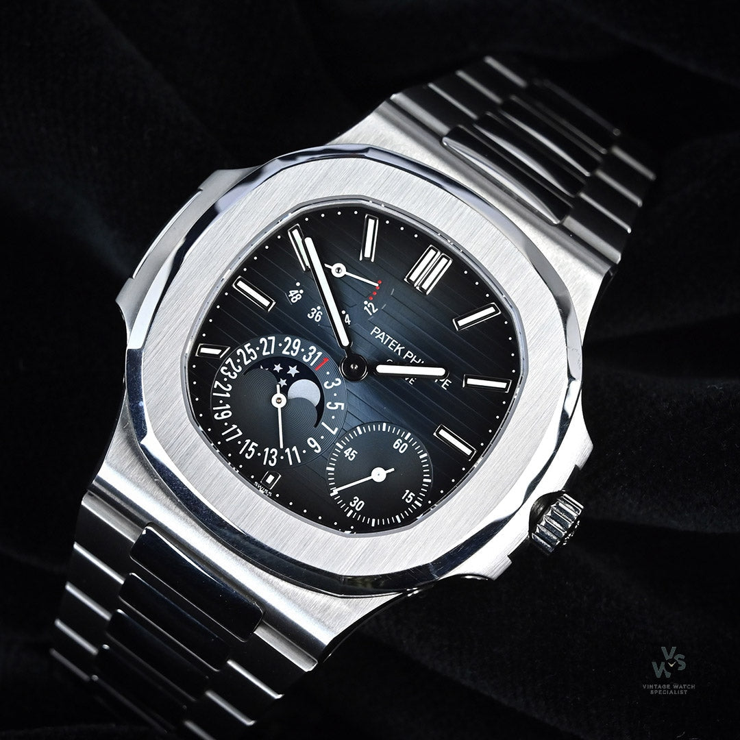 Patek Philippe Nautilus 5712 1A Date Moon Phases Complete Set D Vintage Watch Specialist