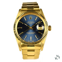 Rolex Oyster Perpetual Date 14K Gold - Blue Dial - Vintage Watch Specialist