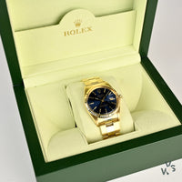 Rolex Oyster Perpetual Date 14K Gold - Blue Dial - Vintage Watch Specialist