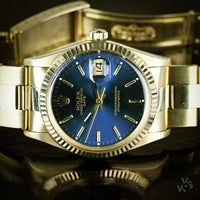 Rolex Oyster Perpetual Date 14K Gold - Blue Dial - Vintage Watch Specialist