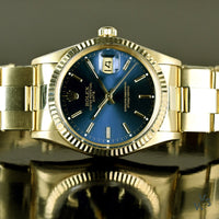 Rolex Oyster Perpetual Date 14K Gold - Blue Dial - Vintage Watch Specialist