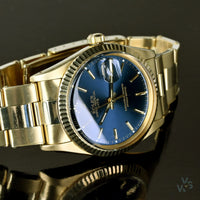 Rolex Oyster Perpetual Date 14K Gold - Blue Dial - Vintage Watch Specialist